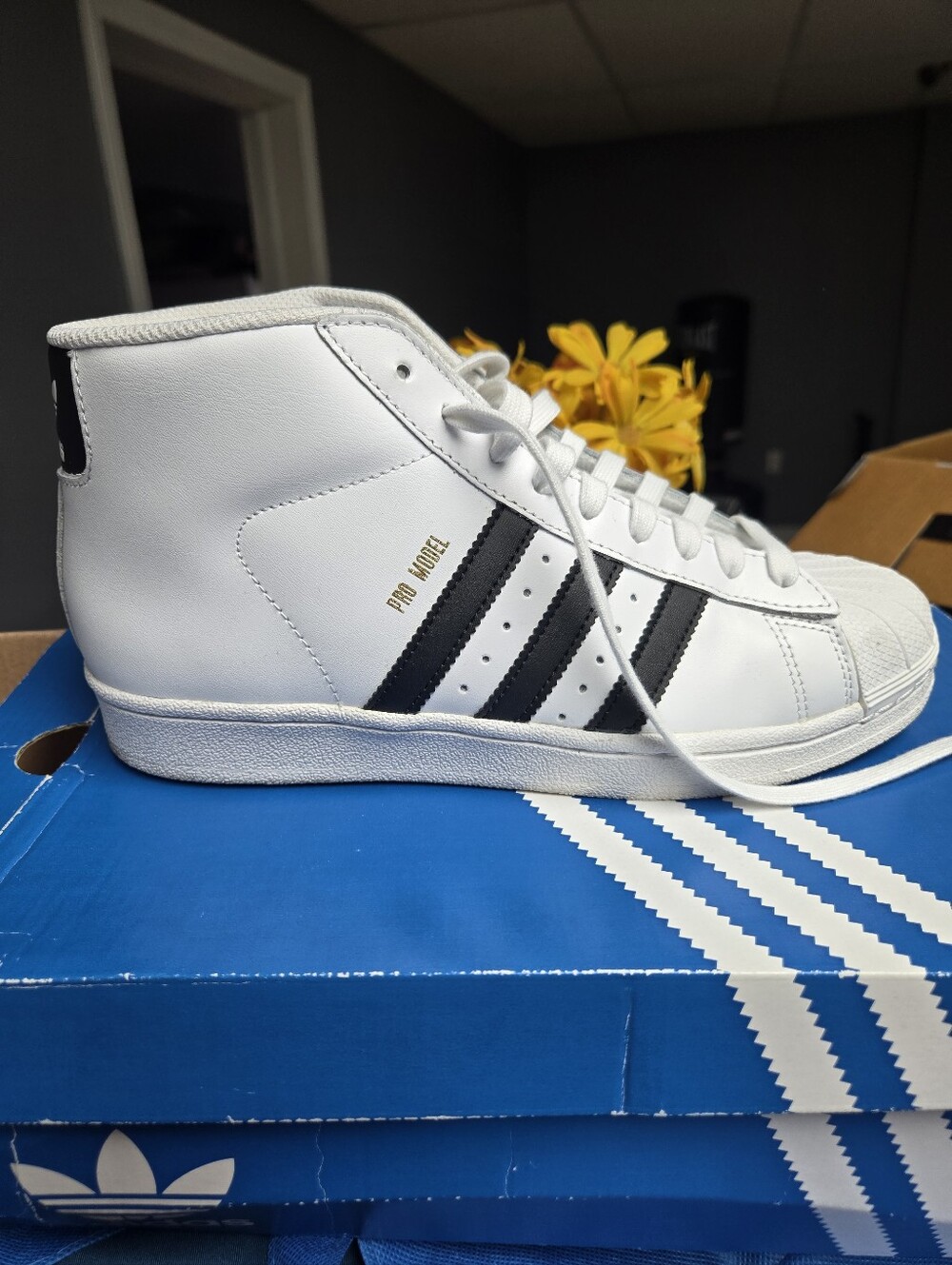 Adidas Pro Model Mid-Top Sneakers in White and Black